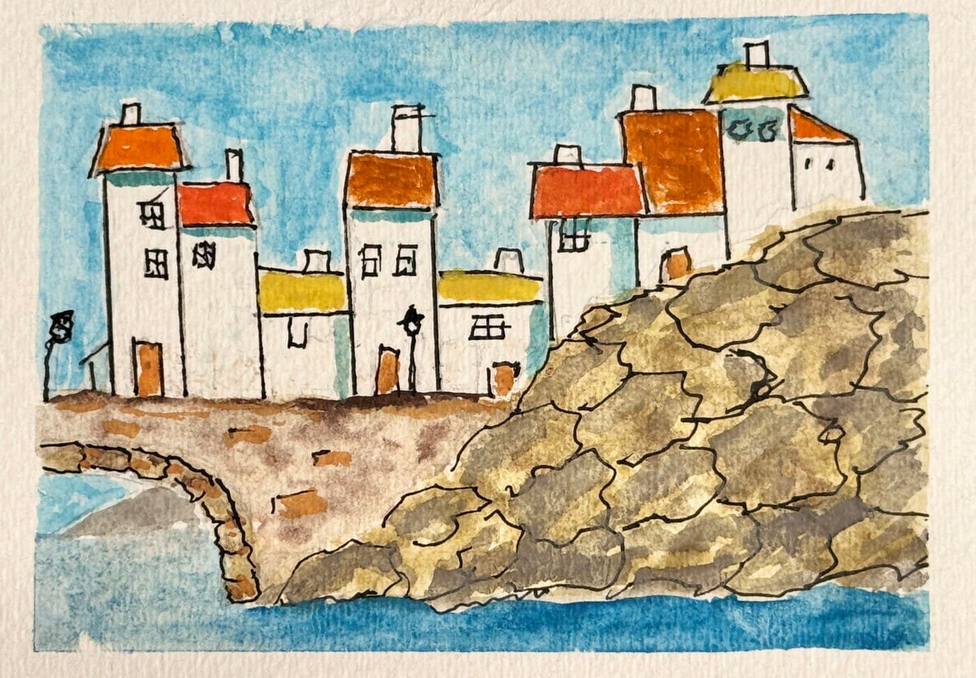 Watercolor and ink of white cottages with orange and red roofs clustered above a rocky shore and blue sea